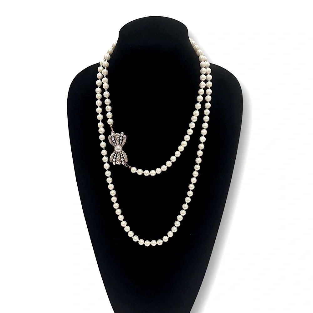 Miss Mandy's Double-Strand Ivory Pearl Necklace with Jeweled Bow Accent
